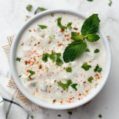 Cucumber Raitha (Chopped Cucumber with Yoghurt and spices) indiancurrybowl